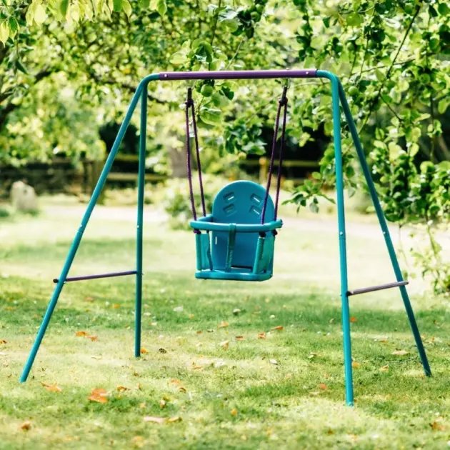 Plum® Metal 2-in-1 toddler swing set with steel frame and harness in outdoor garden