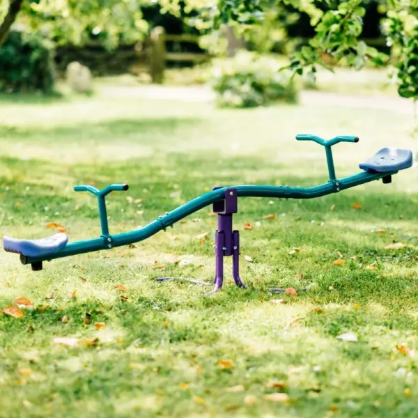 Metal rotating see saw with teal and purple steel frame for kids in garden